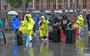 In Amsterdam liepen toeristen woensdag voor het eerst in weken weer eens door de stromende regen.