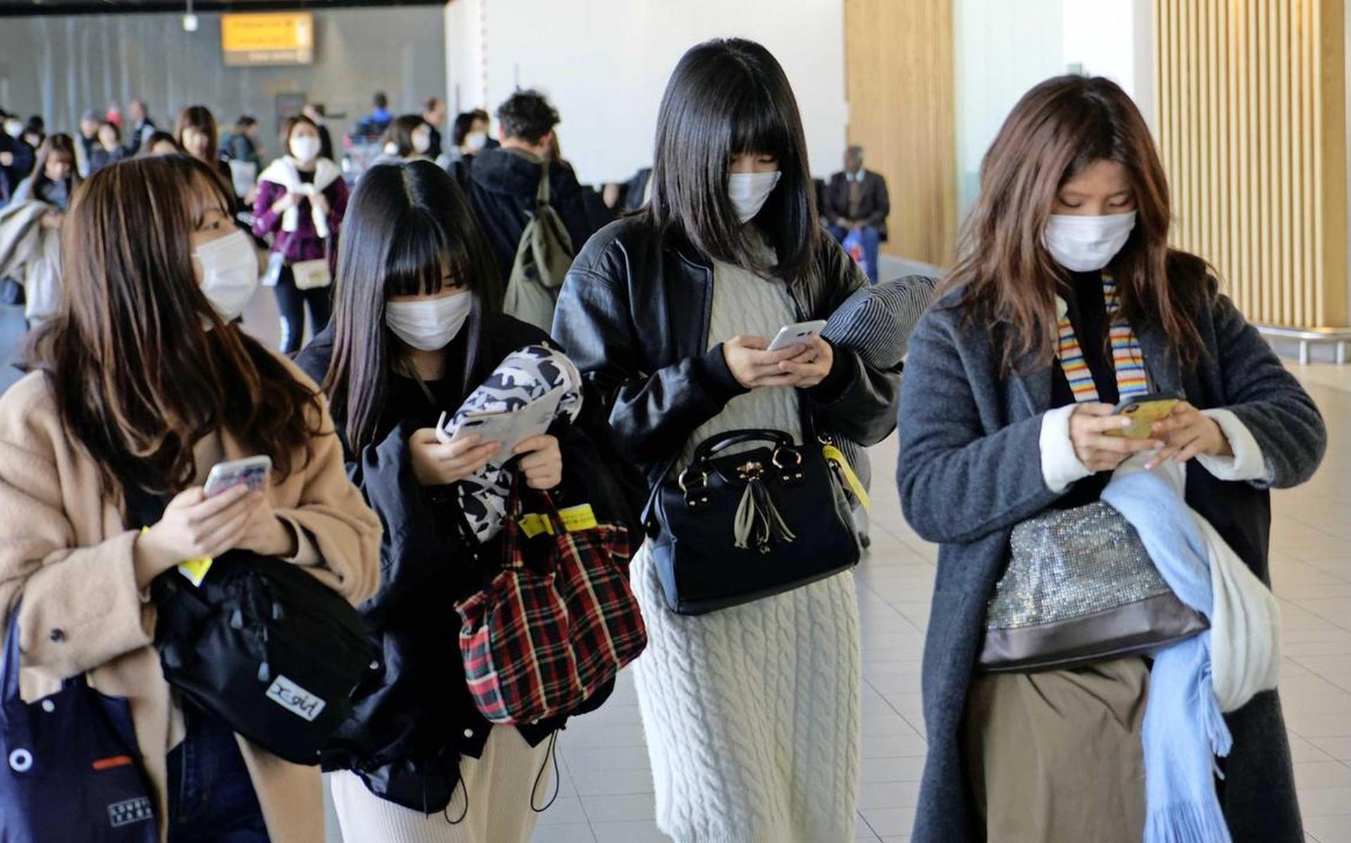 Chinese toeristen op Schiphol.
