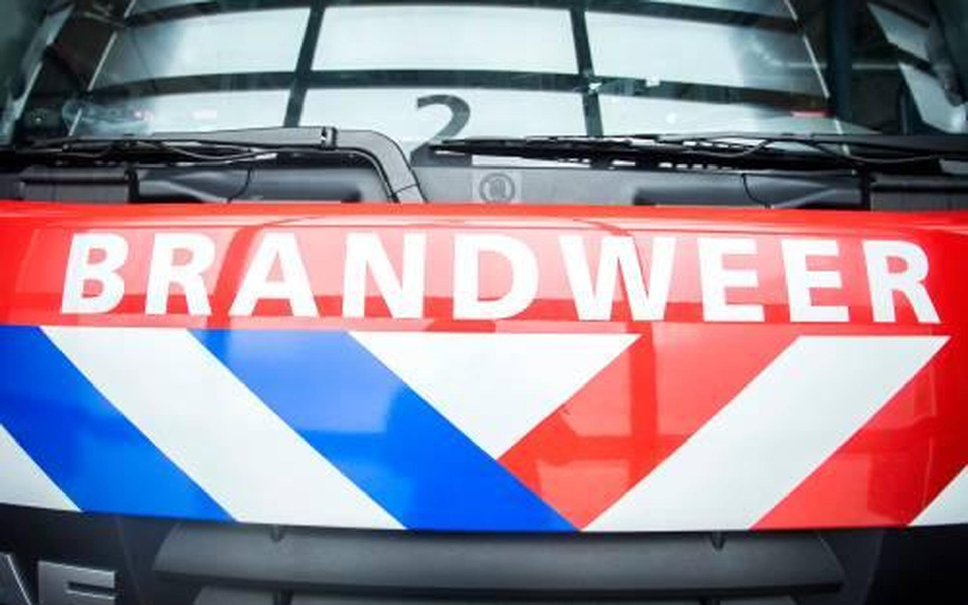 Woningen ontruimd na brand winkelpand Den Haag