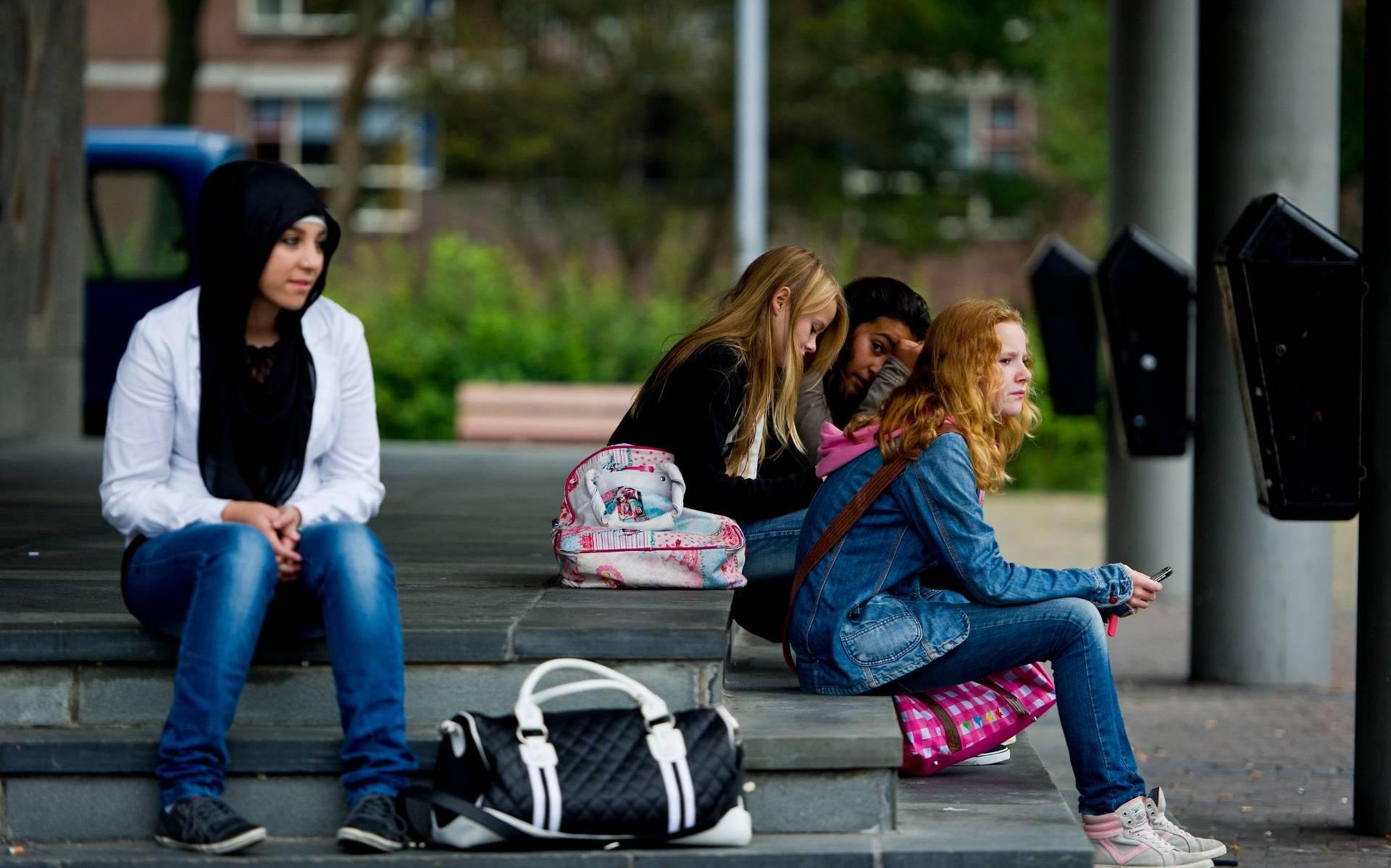 'Een derde middelbare scholen schaft zittenblijven af'