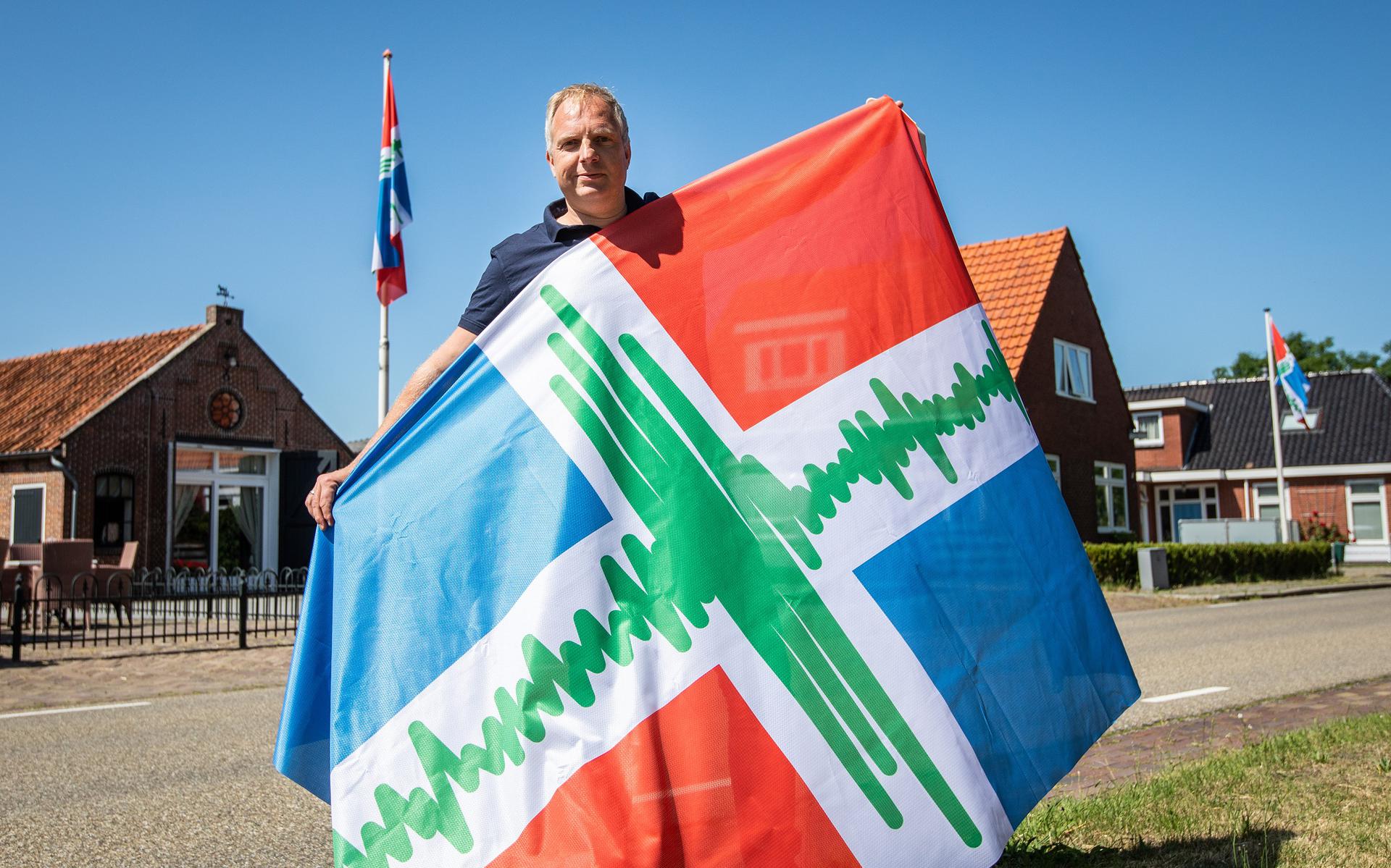 Ondernemer Mark van Esveld heeft een Groninger aardbevingsvlag bedacht. Foto: Huisman Media