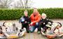 De beloftevolle kartracers Luca (13) en Mika (8) Kayser uit Emmen willen niets liever dan in de voetsporen treden van wereldkampioen Max Verstappen. Op de foto worden de beide beloftevolle coureurs geflankeerd door vader Bennie.