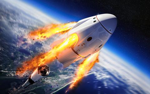Impressie van ruimteraket dat 7 passagiers kan vervoeren, van Amerikaanse bedrijf SpaceX, van Elon Musk.