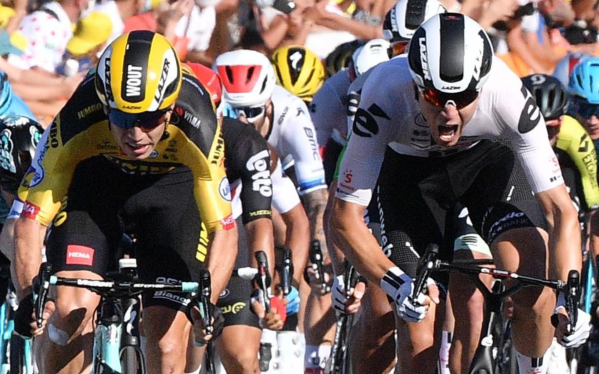 TOPSHOT - Team Jumbo rider Belgium's Wout van Aert (C-L) sprints to cross the finish line ahead of Team Sunweb rider Netherlands' Cees Bol (C-R) at the end of the 5th stage of the 107th edition of the Tour de France cycling race, 185 km between Gap and Privas, on September 2, 2020. (Photo by Anne-Christine POUJOULAT / various sources / AFP)